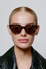 Sonnenbrille Kaws Black And Yellow Tortoise