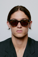 Sonnenbrille Kaws Black And Yellow Tortoise