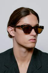 Sonnenbrille Kaws Black And Yellow Tortoise
