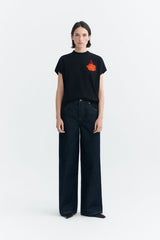 Thinking MU Volta Mandarinas Damen T-Shirt aus Bio-Baumwolle in Schwarz mit weiter dunkler Hose – Youmee.market Schweiz