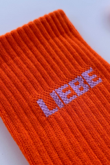 Socken Liebe Orange-Flieder