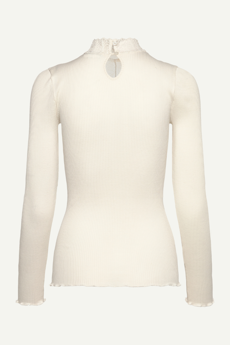 Longsleeve in creme mit Spitze am V-Ausschnitt und Rollkraken von Rosemunde Copenhagen im youmee.market bern