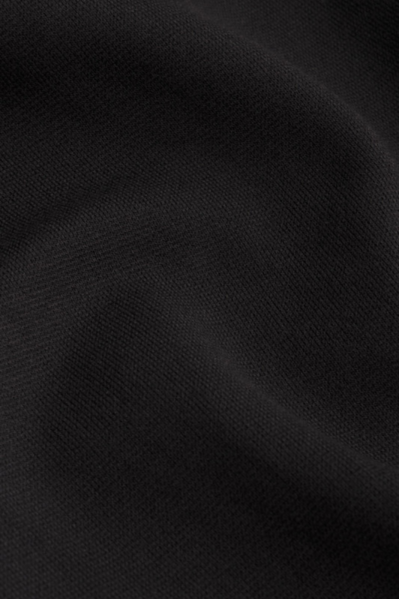 Nahaufnahme eines schwarzen Crepe-ersey Stoffes