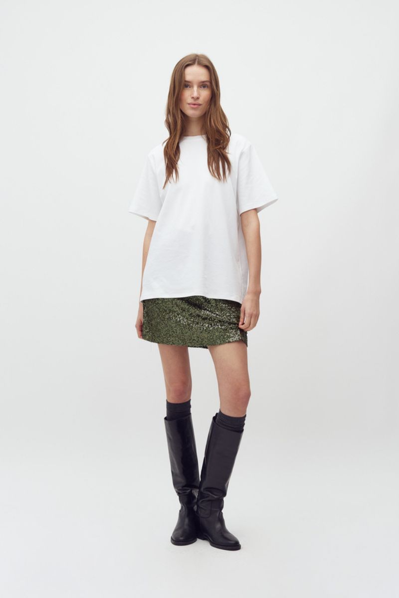 Pailletten Mini-Rock jupe getragen von Frau in grün im youmee.market in Bern 