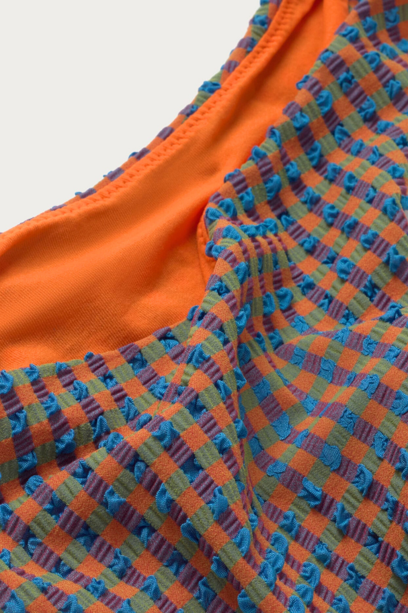 Thinking MU Bikini-Unterteil Sicilia mit Seersucker-Struktur in Orange-Blau, erhältlich bei Youmee.market Schweiz