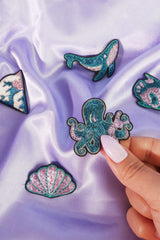 Brosche Oktopus